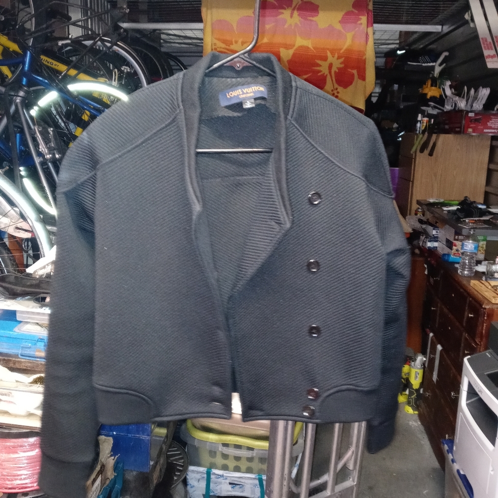 Louis Vuitton Woman in Black uniform jacket